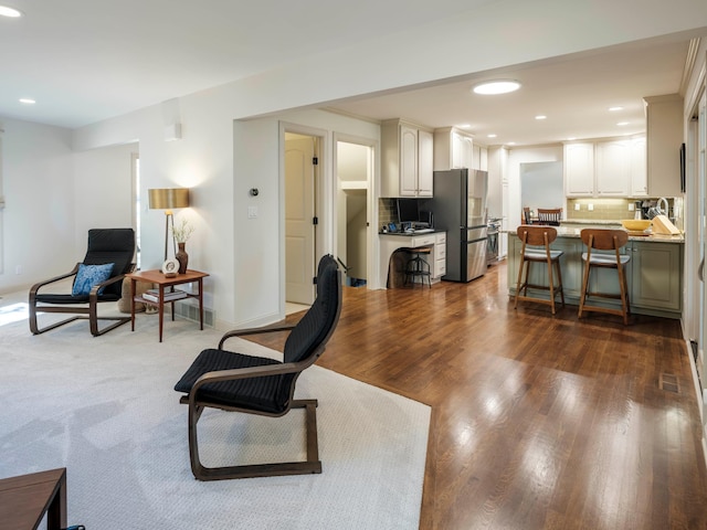 living room with hardwood / wood-style flooring