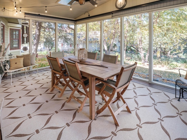 sunroom / solarium featuring ceiling fan, wooden ceiling, and vaulted ceiling