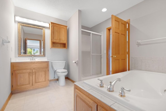 full bathroom with vanity, separate shower and tub, toilet, and a textured ceiling