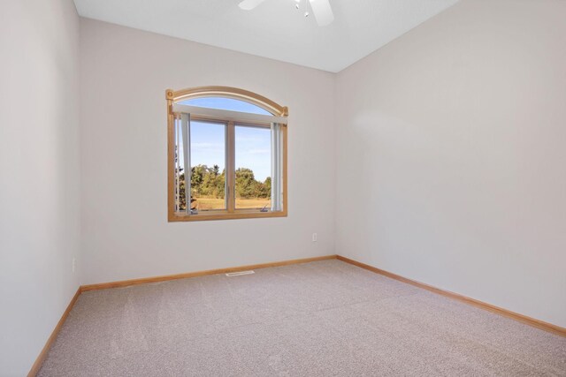 16377 Eidelweiss St NW, Andover, MN 55304 - unfurnished room featuring carpet flooring, visible vents, baseboards, and a ceiling fan
