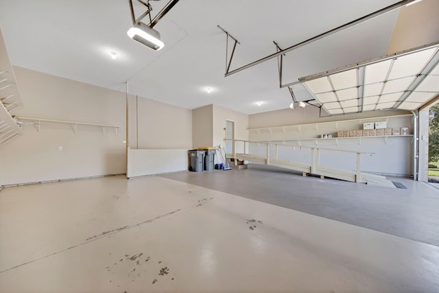 16377 Eidelweiss St NW, Andover, MN 55304 - garage featuring a garage door opener