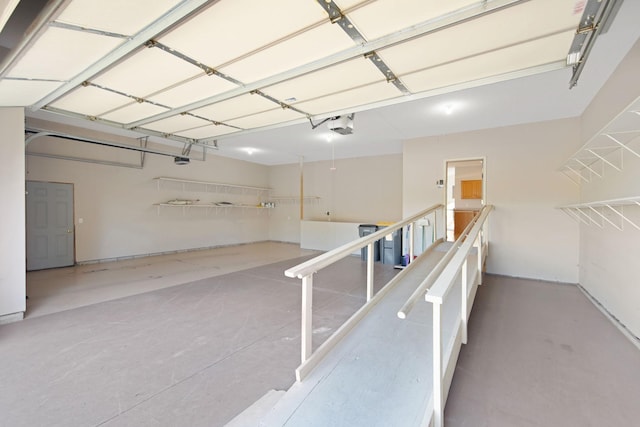 16377 Eidelweiss St NW, Andover, MN 55304 - garage featuring a garage door opener