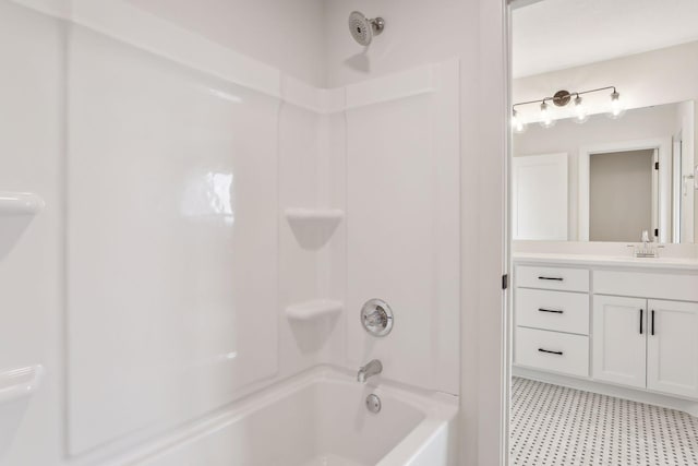 bathroom with shower / bathtub combination and vanity