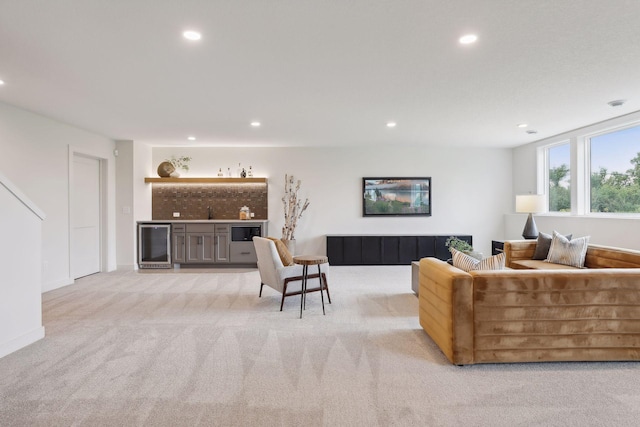 carpeted living room featuring beverage cooler