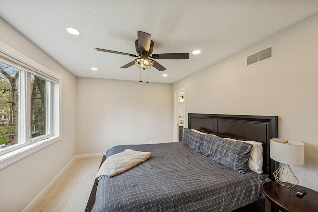 bedroom featuring carpet flooring, recessed lighting, baseboards, and visible vents