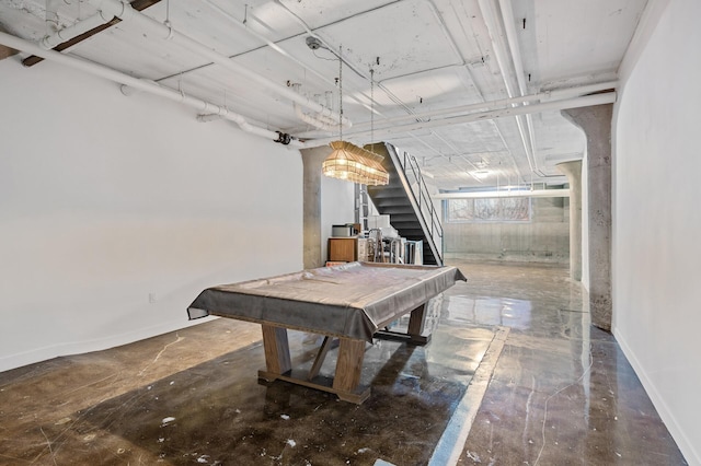 rec room with pool table and concrete floors