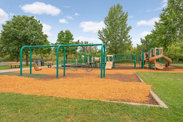 view of jungle gym featuring a lawn