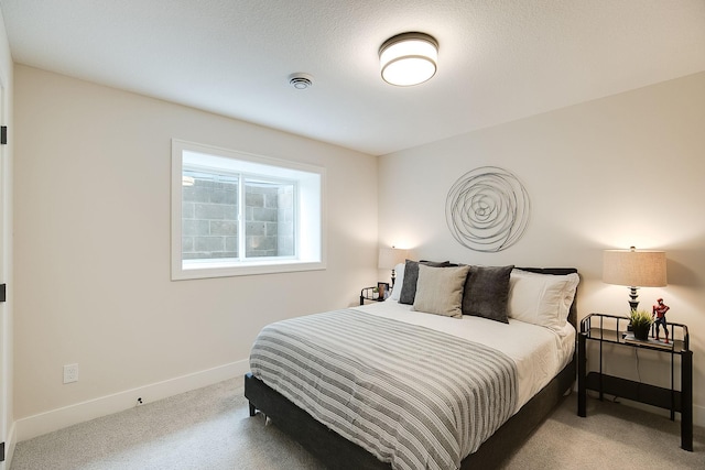 bedroom with light carpet