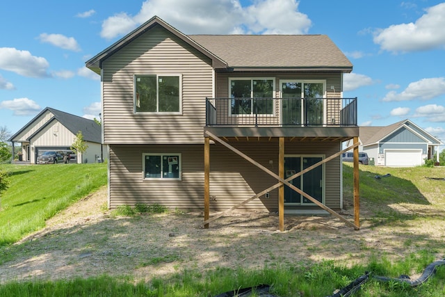 back of house with a yard and a deck