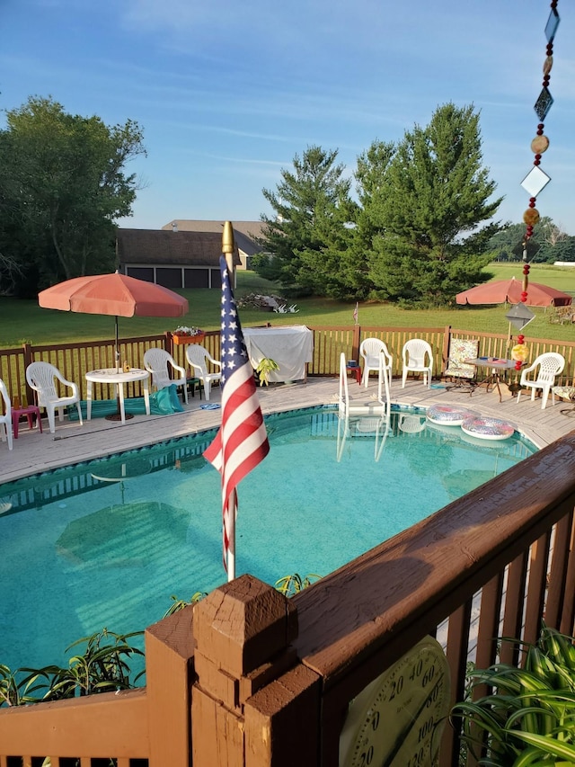 view of pool featuring a deck