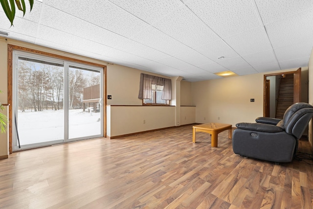 living room featuring hardwood / wood-style flooring and a wealth of natural light