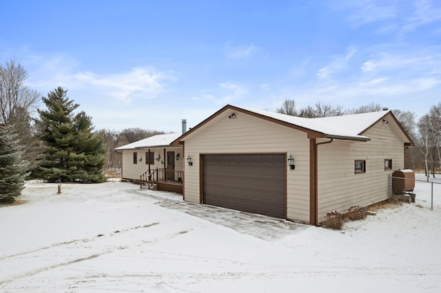 single story home with a garage