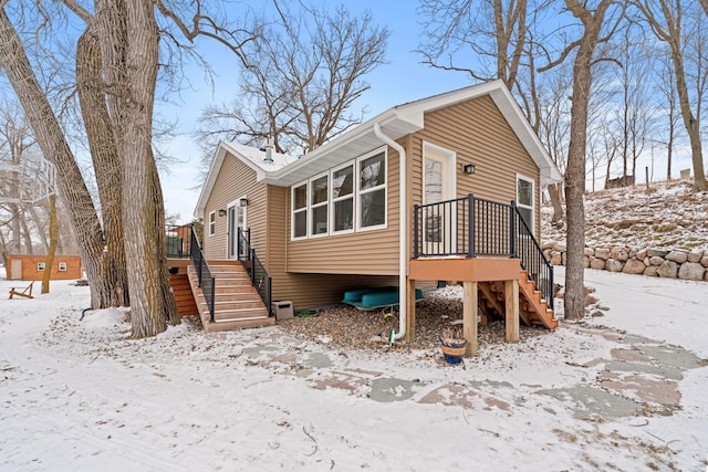 view of front facade featuring a wooden deck