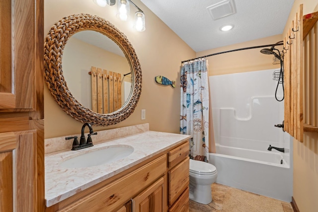 full bathroom with toilet, tile patterned flooring, shower / bath combination with curtain, a textured ceiling, and vanity