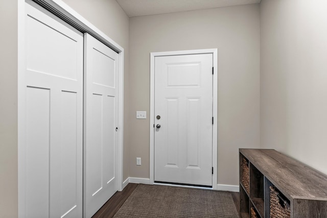 doorway featuring dark hardwood / wood-style flooring