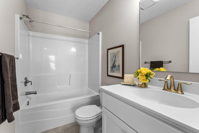 full bathroom with shower / tub combination, vanity, a textured ceiling, and toilet