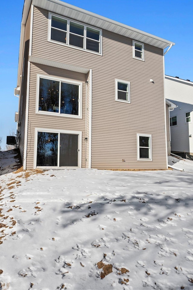 view of snow covered house