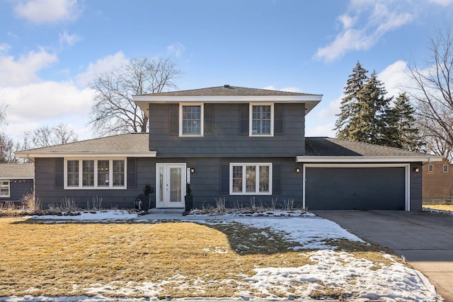 front facade with a garage