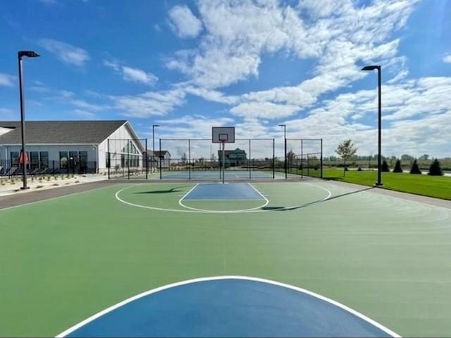 view of basketball court with tennis court