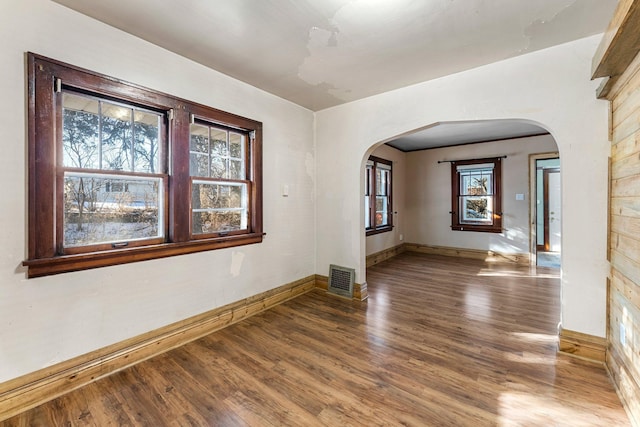 empty room with wood-type flooring