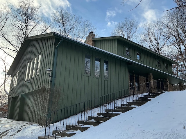 view of snow covered property