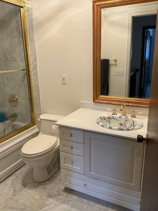 full bathroom featuring vanity, toilet, and enclosed tub / shower combo