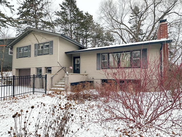 tri-level home featuring a garage