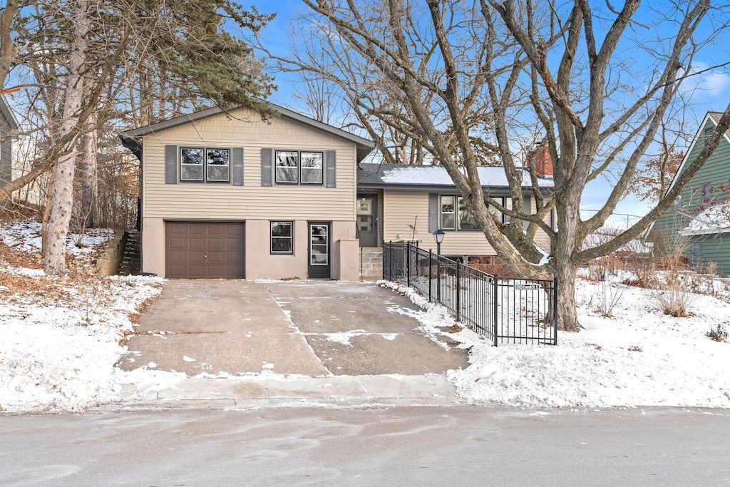 split level home featuring a garage