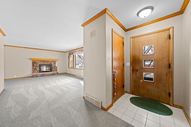 entryway with light colored carpet and ornamental molding