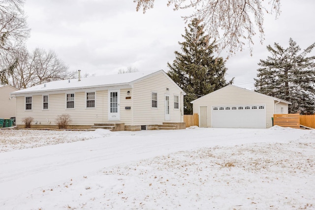 view of front of house featuring an outbuilding and a garage