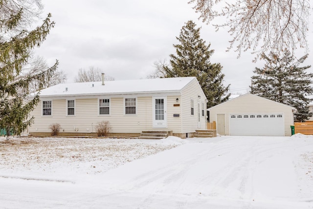 view of front of house featuring an outbuilding and a garage