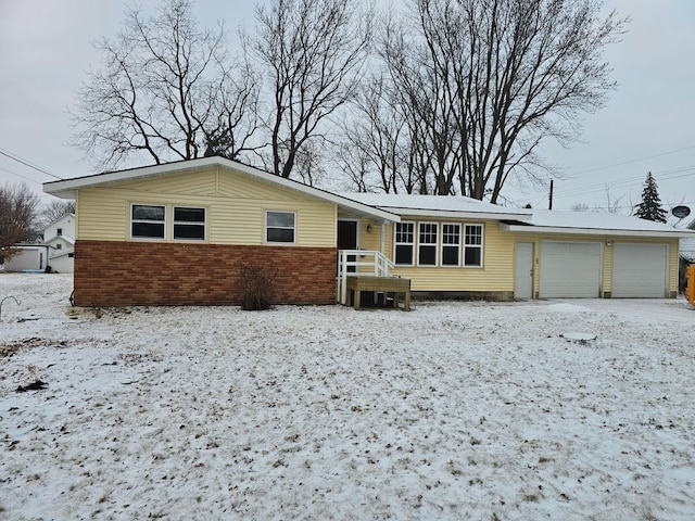 single story home with a garage