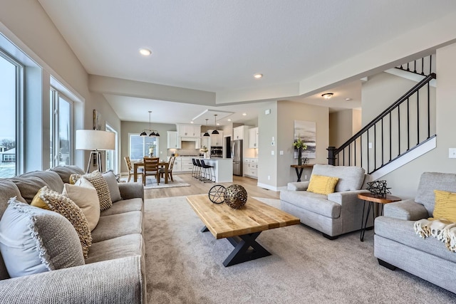 living room with light hardwood / wood-style flooring