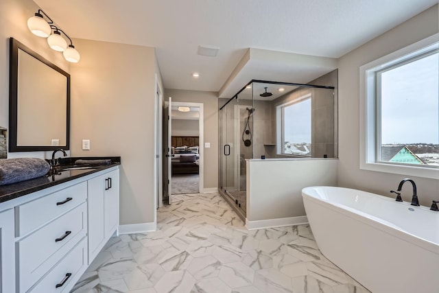 bathroom featuring vanity and plus walk in shower