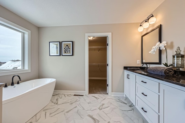 bathroom featuring a bathtub and vanity