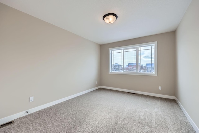 view of carpeted spare room