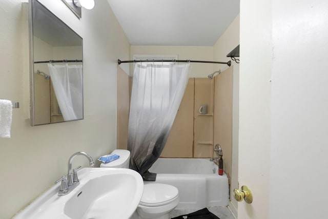 full bathroom with toilet, sink, and shower / bath combo with shower curtain