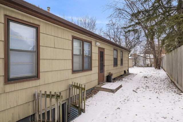 view of snow covered property