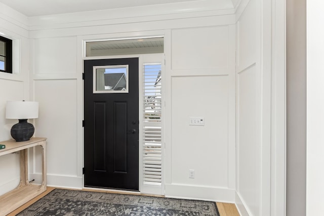 foyer with hardwood / wood-style floors