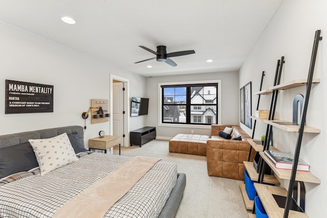 bedroom with light colored carpet and ceiling fan