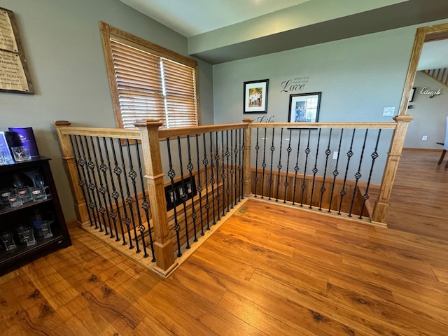 310 7th St SW, Roseau, MN 56751 - stairway featuring wood finished floors