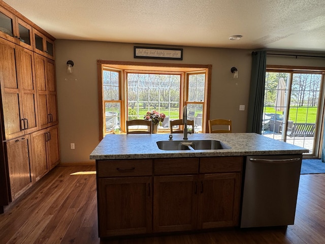 310 7th St SW, Roseau, MN 56751 - kitchen featuring a sink, glass insert cabinets, dark wood-type flooring, a textured ceiling, and dishwasher