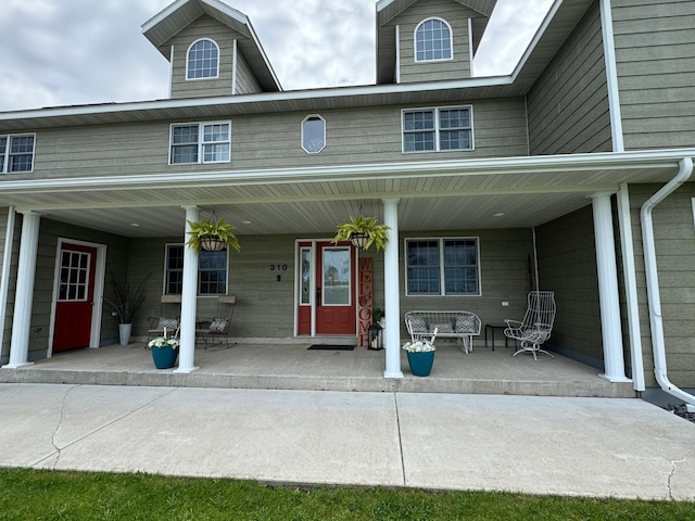 310 7th St SW, Roseau, MN 56751 - view of exterior entry with a porch