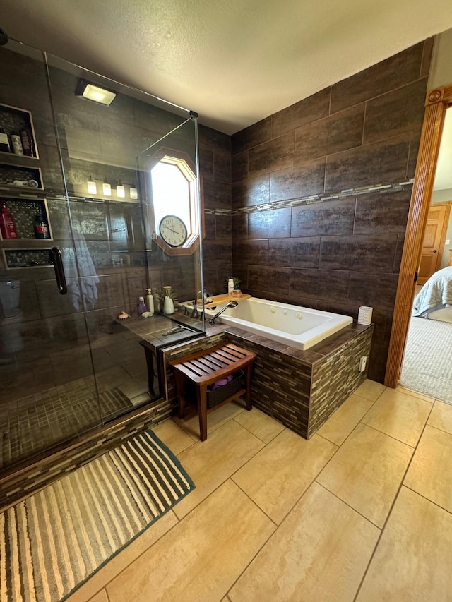 310 7th St SW, Roseau, MN 56751 - full bathroom with a tub with jets, tile patterned flooring, a shower stall, and a textured ceiling