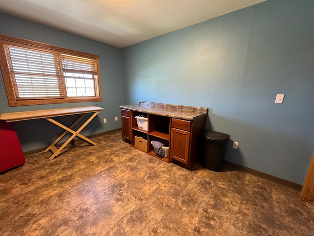 310 7th St SW, Roseau, MN 56751 - office space with baseboards and dark floors