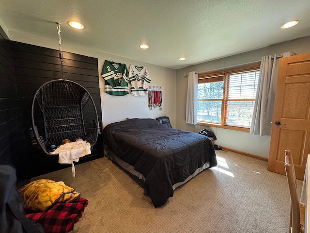 310 7th St SW, Roseau, MN 56751 - carpeted bedroom featuring a textured ceiling, recessed lighting, and baseboards