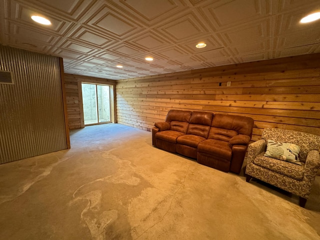 310 7th St SW, Roseau, MN 56751 - living room featuring wooden walls, recessed lighting, an ornate ceiling, and carpet floors