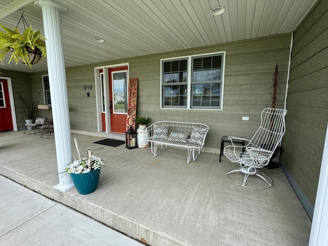 310 7th St SW, Roseau, MN 56751 - wooden deck with covered porch