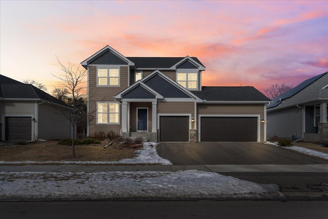 view of front of property with a garage