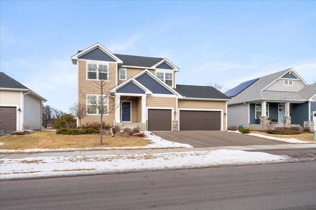 craftsman-style house featuring aphalt driveway, stone siding, a garage, and a porch